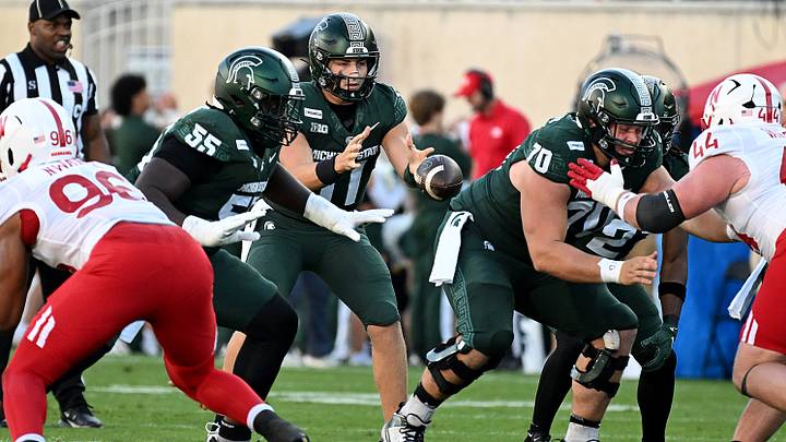 Sep 26, 2026; East Lansing, Michigan, USA; Michigan State Spartans quarterback Alessio Milivojevic (11) takes a snap during the first quarter against the Nebraska Cornhuskers at Spartan Stadium. Mandatory Credit: Dale Young-Imagn Images Sep 26, 2026; East Lansing, Michigan, USA; Michigan State Spartans quarterback Alessio Milivojevic (11) takes a snap during the first quarter against the Nebraska Cornhuskers at Spartan Stadium. Mandatory Credit: Dale Young-Imagn Images