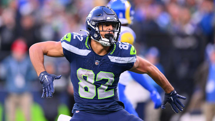 Nov 3, 2024; Seattle, Washington, USA; Seattle Seahawks wide receiver Cody White (82) celebrates after making a catch against the Los Angeles Rams during the second half at Lumen Field. Mandatory Credit: Steven Bisig-Imagn Images