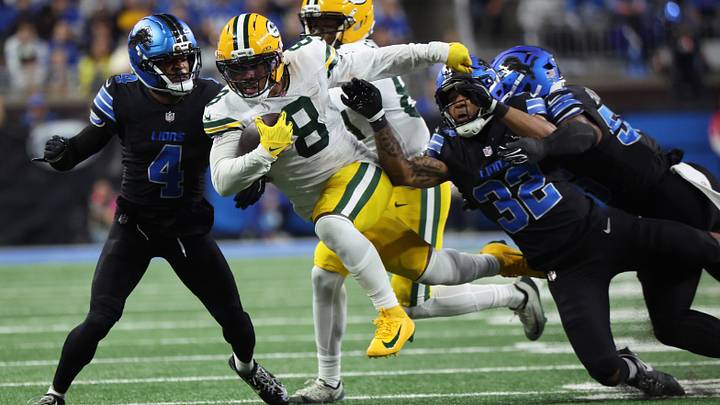 Green Bay Packers running back Josh Jacobs (8) runs the ball during the fourth quarter against the Detroit Lions at Ford Field. 