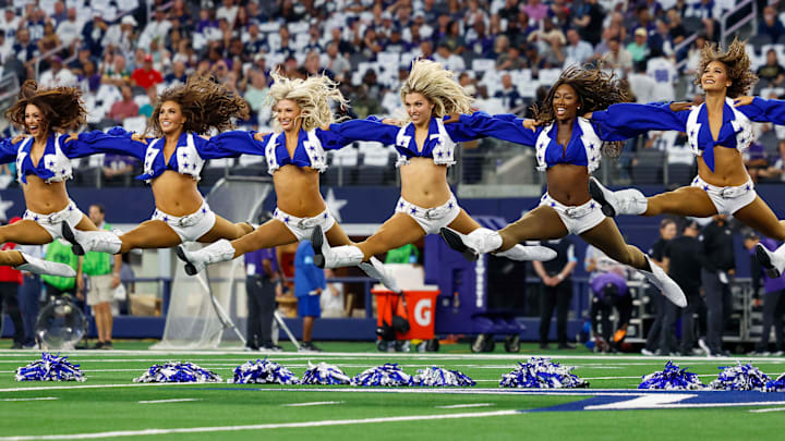 The Dallas Cowboys Cheerleaders perform during the game against the Baltimore Ravens.