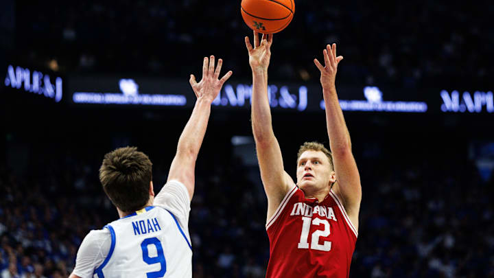 Indiana forward Tucker Devries takes a shot against Kentucky forward Trent Noah on Dec. 13, 2025, at Rupp Arena in Lexington. Indiana forward Tucker Devries takes a shot against Kentucky forward Trent Noah on Dec. 13, 2025, at Rupp Arena in Lexington.