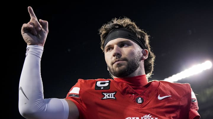 Oct 25, 2025; Cincinnati, Ohio, USA;  Cincinnati Bearcats quarterback Brendan Sorsby points to fans as he walks off the field after defeating the Baylor Bears at Nippert Stadium. Mandatory Credit: Aaron Doster-Imagn Images