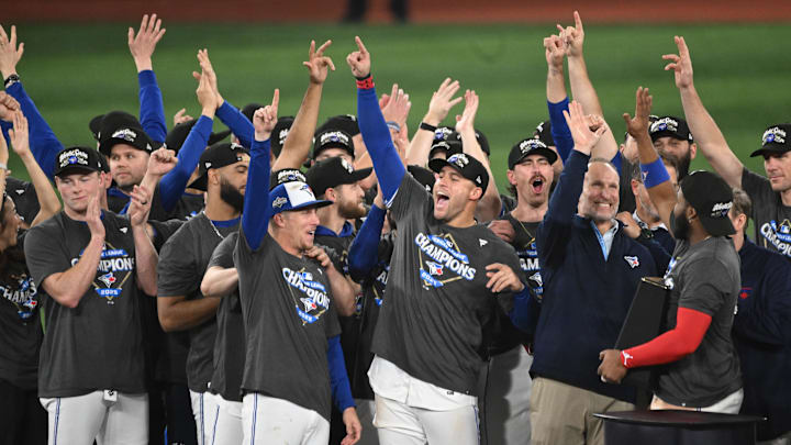 Oct 20, 2025; Toronto, Ontario, CAN; Toronto Blue Jays celebrate after winning game seven of the ALCS round for the 2025 MLB playoffs against the Seattle Mariners at Rogers Centre. Oct 20, 2025; Toronto, Ontario, CAN; Toronto Blue Jays celebrate after winning game seven of the ALCS round for the 2025 MLB playoffs against the Seattle Mariners at Rogers Centre.