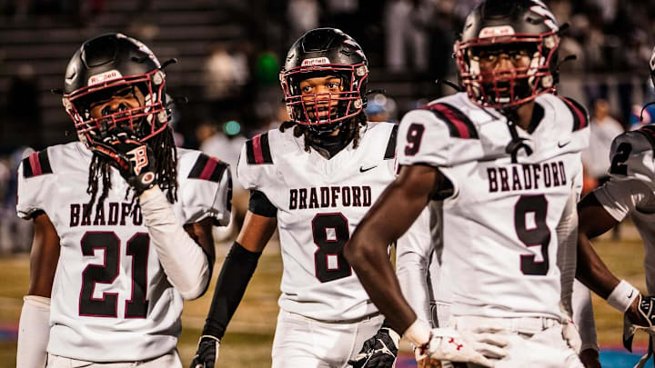 Corbin Burrell-Warfield (8) of Kenosha Bradford has been voted High School on SI Wisconsin's Defensive Player of the Week. Also pictured are Zacchaeus Ross (21) and Brandon Walton (9).