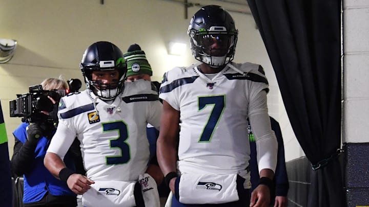 Jan 5, 2020; Philadelphia, Pennsylvania, USA; Seattle Seahawks quarterback Russell Wilson (3) and quarterback Geno Smith (7) walk out of the tunnel for pregame warmups before the start of the NFC Wild Card playoff football game against the Philadelphia Eagles at Lincoln Financial Field.