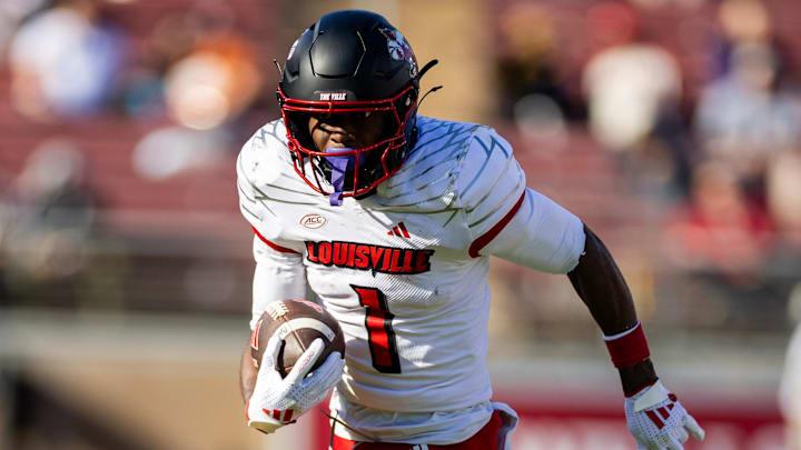 Nov 16, 2024; Stanford, California, USA; Louisville Cardinals wide receiver Ja'Corey Brooks (1) runs with the ball during the second quarter against the Stanford Cardinal at Stanford Stadium.
