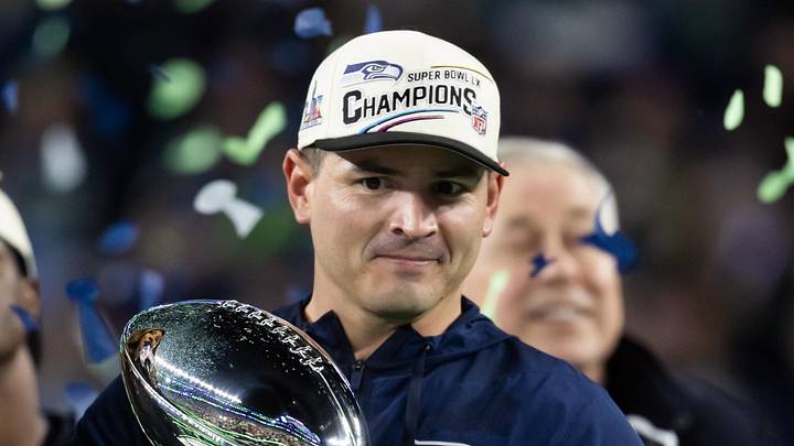 Seattle Seahawks head coach Mike Macdonald celebrates with the Vince Lombardi trophy