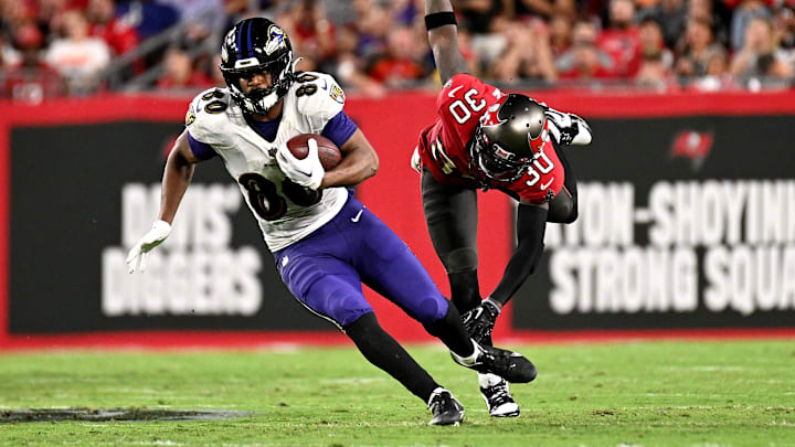 Oct 27, 2022; Tampa, Florida, USA; Baltimore Ravens tight end Isaiah Likely (80) gets past Tampa Bay Buccaneers defensive back Dee Delaney (30) in the second half at Raymond James Stadium. Mandatory Credit: Jonathan Dyer-Imagn Images Oct 27, 2022; Tampa, Florida, USA; Baltimore Ravens tight end Isaiah Likely (80) gets past Tampa Bay Buccaneers defensive back Dee Delaney (30) in the second half at Raymond James Stadium. Mandatory Credit: Jonathan Dyer-Imagn Images