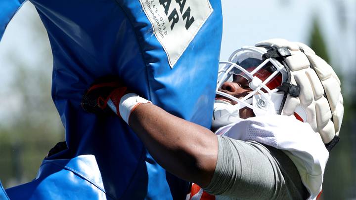 Oklahoma State Cowboys defensive tackle Armstrong Nnodim run a drill during spring football practice at Sherman E. Smith Training Center. 