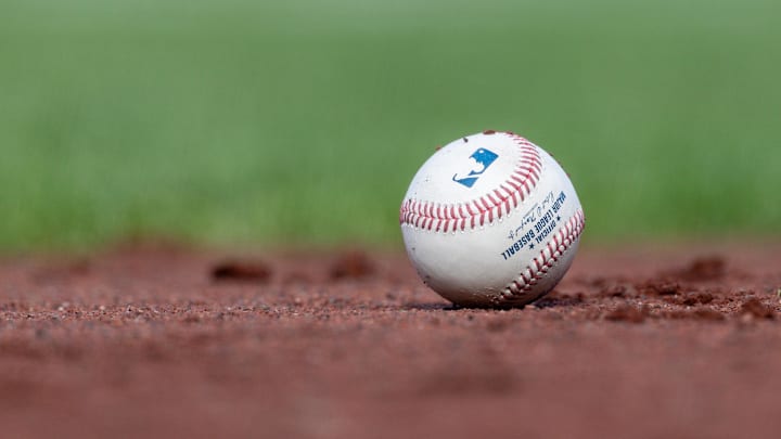 Jul 27, 2025; San Francisco, California, USA; A MLB baseball sits on the infield during the game between the San Francisco Giants and the New York Mets at Oracle Park. Mandatory Credit: Bob Kupbens-Imagn Images