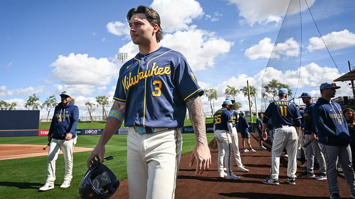 Milwaukee Brewers infield prospect Andrew Fischer walks across the field during spring training workouts Tuesday, February 17, 2026, at American Family Fields of Phoenix in Phoenix, Arizona. Milwaukee Brewers infield prospect Andrew Fischer walks across the field during spring training workouts Tuesday, February 17, 2026, at American Family Fields of Phoenix in Phoenix, Arizona.