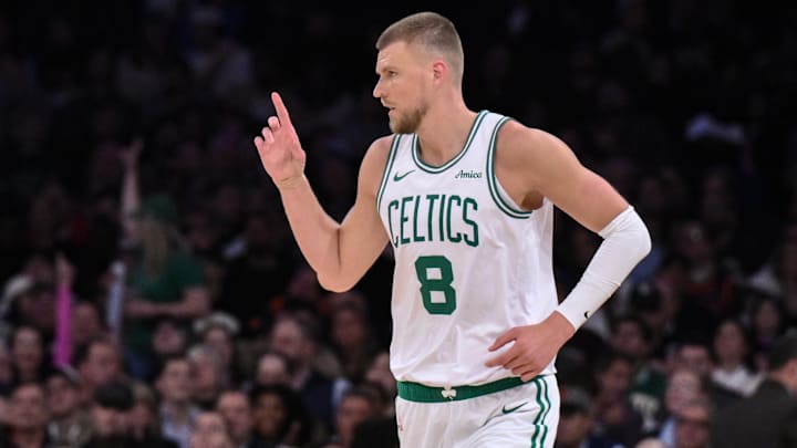 Apr 8, 2025; New York, New York, USA; Boston Celtics center Kristaps Porzingis (8) reacts during the first half against the New York Knicks at Madison Square Garden. Mandatory Credit: John Jones-Imagn Images