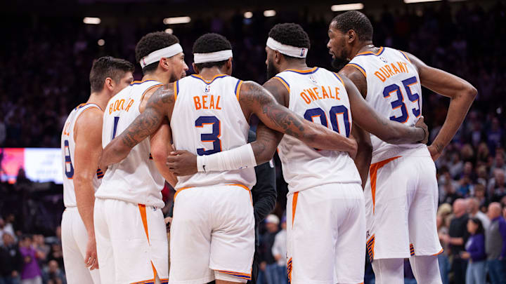 Apr 12, 2024; Sacramento, California, USA; Phoenix Suns guard Grayson Allen (8) and guard Devin Booker (1) and guard Bradley Beal (3) and forward Royce O'Neale (00) and forward Kevin Durant (35) huddle up before the final seconds of the fourth quarter at Golden 1 Center. Mandatory Credit: Ed Szczepanski-Imagn Images Apr 12, 2024; Sacramento, California, USA; Phoenix Suns guard Grayson Allen (8) and guard Devin Booker (1) and guard Bradley Beal (3) and forward Royce O'Neale (00) and forward Kevin Durant (35) huddle up before the final seconds of the fourth quarter at Golden 1 Center. Mandatory Credit: Ed Szczepanski-Imagn Images