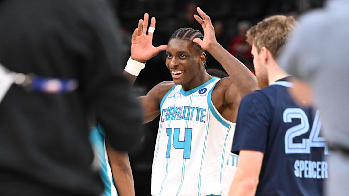 Jan 28, 2026; Memphis, Tennessee, USA; Charlotte Hornets forward Moussa Diabate (14) celebrates after stealing and dunking the ball in the fourth quarter against the Memphis Grizzlies at FedExForum. Mandatory Credit: Matthew Smith-Imagn Images