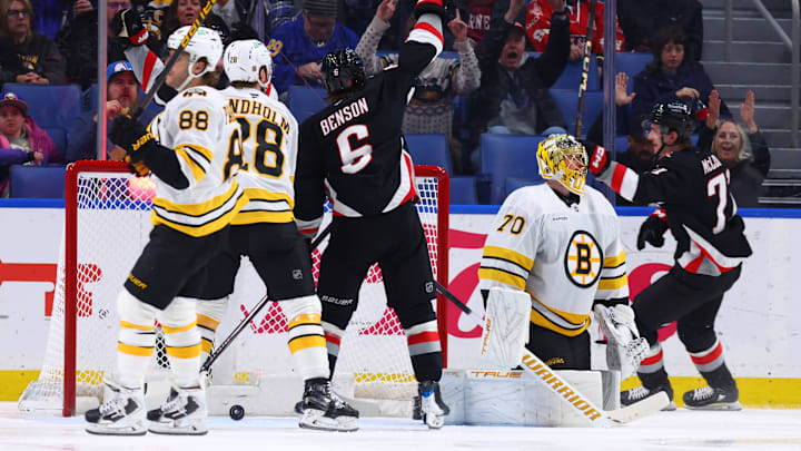 Buffalo Sabres players celebrate a goal agains the Boston Bruins