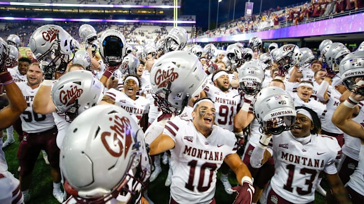 Montana players, including linebacker Marcus Welnel (10), celebrate a 13-7 upset of the UW in 2021. Montana players, including linebacker Marcus Welnel (10), celebrate a 13-7 upset of the UW in 2021.