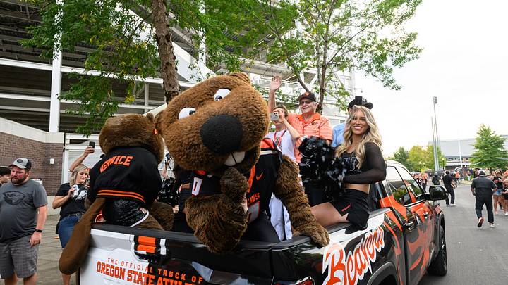 Aug 30, 2025; Corvallis, Oregon, USA; Oregon State Beavers mascot Benny Beaver and cheerleaders lead the team into Reser Stadium before the game against the California Golden Bears. Mandatory Credit: Craig Strobeck-Imagn Images Aug 30, 2025; Corvallis, Oregon, USA; Oregon State Beavers mascot Benny Beaver and cheerleaders lead the team into Reser Stadium before the game against the California Golden Bears. Mandatory Credit: Craig Strobeck-Imagn Images