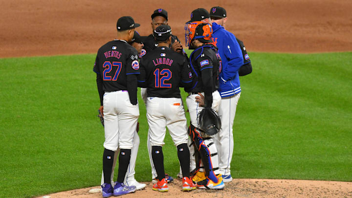 Oct 16, 2024; New York City, New York, USA; New York Mets pitcher Luis Severino (40) and players meet at the mound against the Los Angeles Dodgers in the third inning during game three of the NLCS for the 2024 MLB playoffs at Citi Field. Mandatory Credit: John Jones-Imagn Images