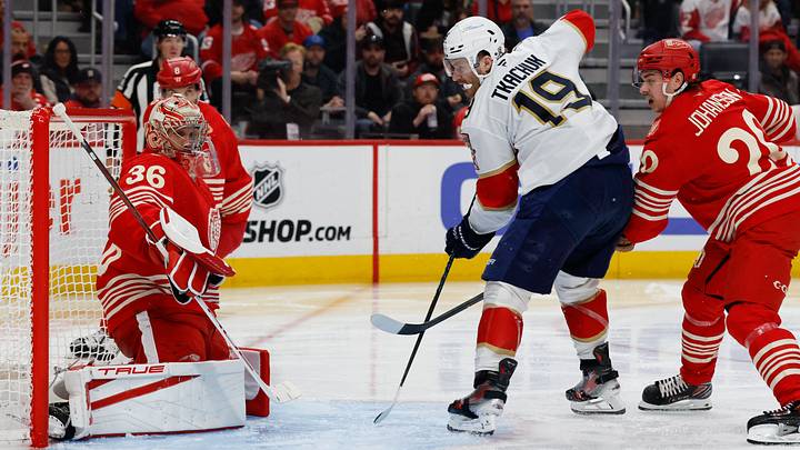 Mar 6, 2026; Detroit, Michigan, USA;  Florida Panthers left wing Matthew Tkachuk (19) scores on Detroit Red Wings goaltender John Gibson (36) in the third period at Little Caesars Arena. Mandatory Credit: Rick Osentoski-Imagn Images