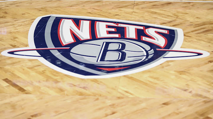 Nov 17, 2021; Brooklyn, New York, USA; The old Nets logo on the court prior to the game between the Cleveland Cavilers and the Brooklyn Nets at Barclays Center. Mandatory Credit: Wendell Cruz-Imagn Images