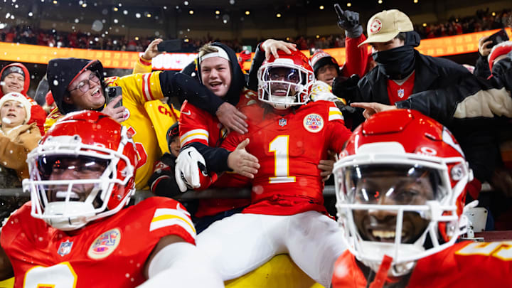 Jan 26, 2025; Kansas City, MO, USA; Kansas City Chiefs wide receiver Xavier Worthy (1) celebrate with fans after a touchdown against the Buffalo Bills during the first half in the AFC Championship game at GEHA Field at Arrowhead Stadium. Mandatory Credit: Mark J. Rebilas-Imagn Images
