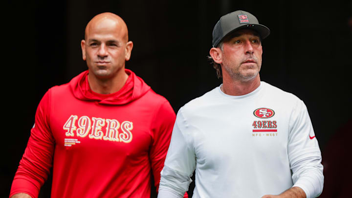 Sep 7, 2025; Seattle, Washington, USA; San Francisco 49ers defensive coordinator Robert Saleh, left, and head coach Kyle Shanahan, right, exit the locker room during pregame warmups against the Seattle Seahawks at Lumen Field. Mandatory Credit: Joe Nicholson-Imagn Images