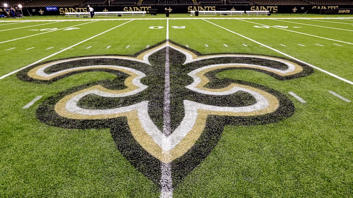 Oct 30, 2022; New Orleans, Louisiana, USA;  General view of the New Orleans Saints logo as the midfield logo fleur-de-lis after the game between the New Orleans Saints and the Las Vegas Raiders at Caesars Superdome. Mandatory Credit: Stephen Lew-Imagn Images