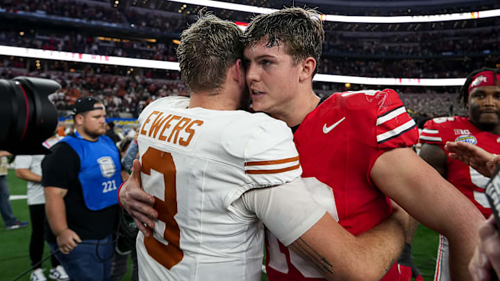 Ohio State quarterback Will Howard (18) meets Texas Longhorns quarterback Quinn Ewers (3) after the College Football Playoff semifinal game in the Cotton Bowl at AT&T Stadium on Friday, Jan. 10, 2024 in Arlington, Texas. Ohio State beat Texas 28-14 to advance to the National Championship.