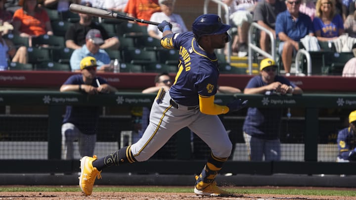 Mar 5, 2024; Scottsdale, Arizona, USA; Milwaukee Brewers centerfielder Jackson Chourio (11) hits an