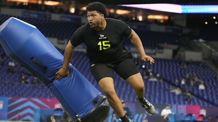 Oregon defensive lineman Derrick Harmon participates in drills during the 2025 NFL Combine at Lucas Oil Stadium.