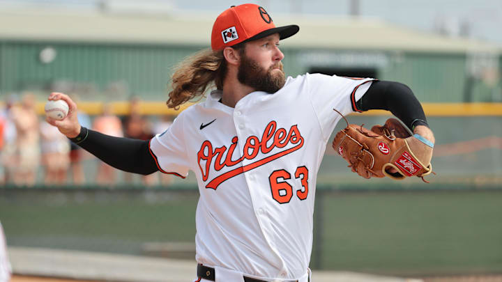 Feb 16, 2025; Sarasota, FL, USA; Baltimore Orioles pitcher Brandon Young (63) throws a bullpen session during spring training workouts at Ed Smith Stadium.
