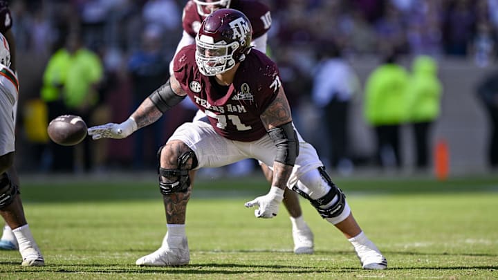 Dec 20, 2025; College Station, TX, USA; Texas A&M Aggies offensive lineman Chase Bisontis (71) blocks the rush during the game between the Aggies and the Hurricanes at Kyle Field. Mandatory Credit: Jerome Miron-Imagn Images