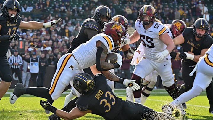 Minnesota’s helmets for Saturday’s game at Chicago’s Wrigley Field vs. Northwestern feature an ivy vine pattern—a tribute to the historic ballpark. Minnesota’s helmets for Saturday’s game at Chicago’s Wrigley Field vs. Northwestern feature an ivy vine pattern—a tribute to the historic ballpark.