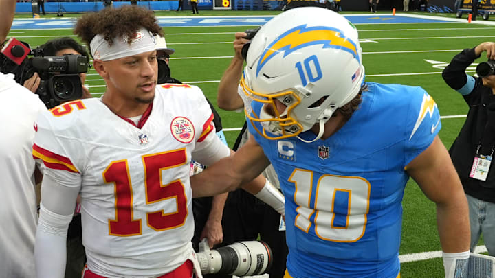 Kansas City Chiefs QB Patrick Mahomes and Los Angeles Chargers QB Justin Herbert shake hands after the game at SoFi Stadium.