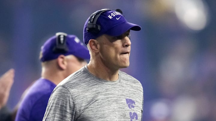 Dec 26, 2024; Phoenix, AZ, USA; Kansas State Wildcats co-offensive coordinator Matt Wells against the Rutgers Scarlet Knights during the Rate Bowl at Chase Field. Mandatory Credit: Mark J. Rebilas-Imagn Images Dec 26, 2024; Phoenix, AZ, USA; Kansas State Wildcats co-offensive coordinator Matt Wells against the Rutgers Scarlet Knights during the Rate Bowl at Chase Field. Mandatory Credit: Mark J. Rebilas-Imagn Images