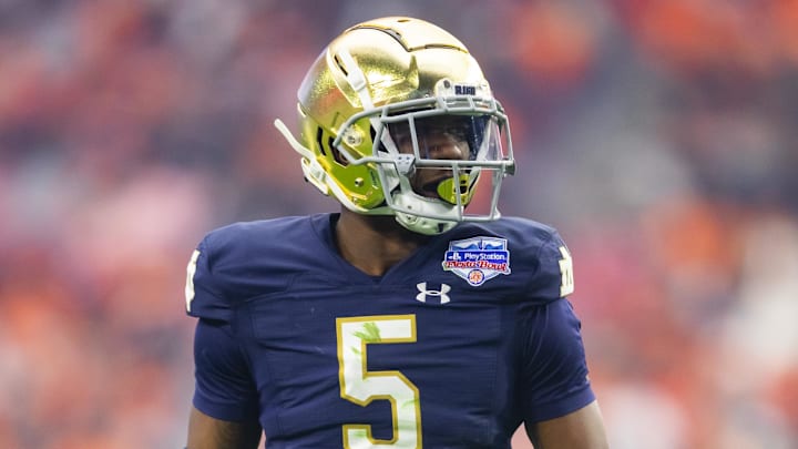 Jan 1, 2022; Glendale, Arizona, USA; Notre Dame Fighting Irish cornerback Cam Hart (5) against the