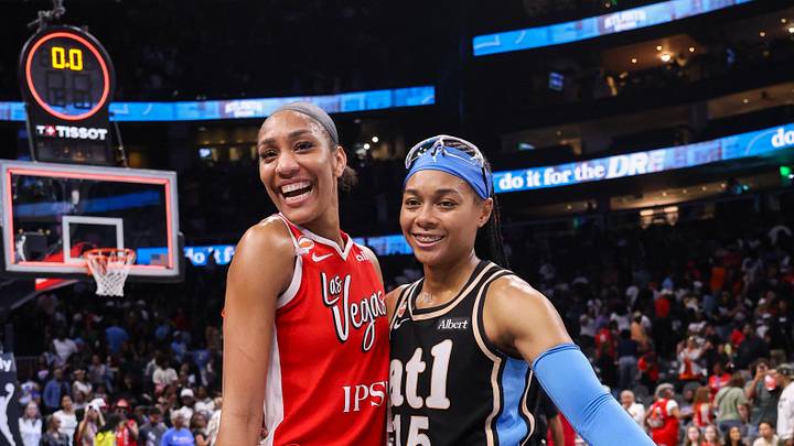 May 17, 2026; Atlanta, Georgia, USA; Las Vegas Aces center A'ja Wilson (22) and Atlanta Dream guard Allisha Gray (15) pose for a photo after a game at State Farm Arena. Mandatory Credit: Brett Davis-Imagn Images