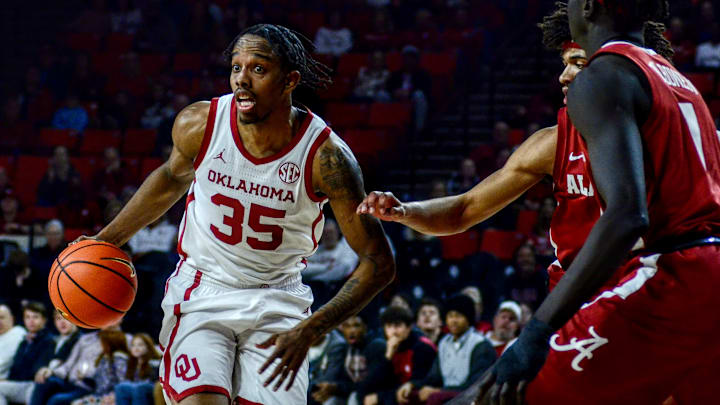 Oklahoma forward Derrion Reid drives against Alabama.