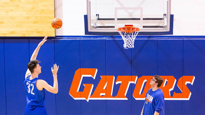 Florida Gators center Olivier Rioux (32) shoots hook shots as the Florida Gators men’s basketball team held a practice on John W. Frost II Practice Court in Gainesville, FL on Tuesday, September 24, 2024. [Doug Engle/Gainesville Sun]