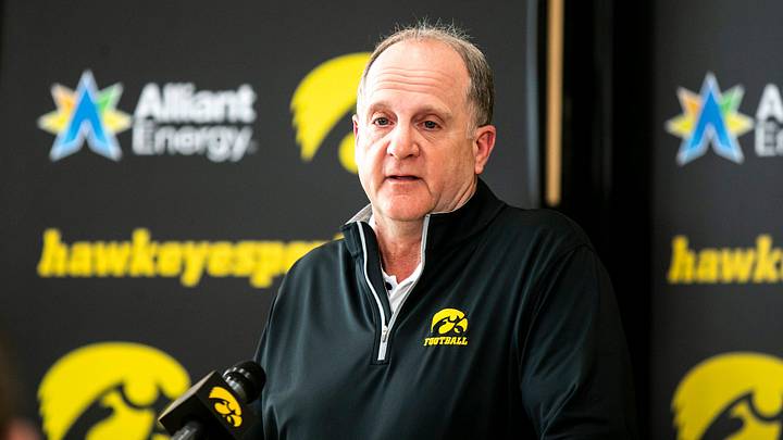 Iowa defensive coordinator Phil Parker speaks with reporters at a spring football news conference, Iowa defensive coordinator Phil Parker speaks with reporters at a spring football news conference,