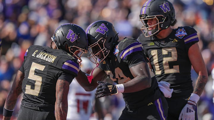 UW receiver Giles Jackson celebrates one of his two Sun Bowl touchdown catches.  