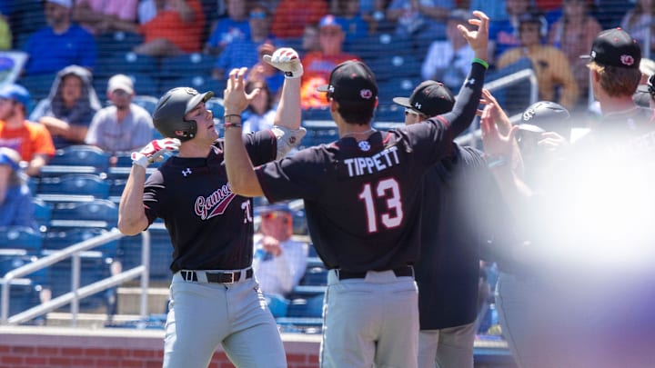Gamecocks utility Ethan Petry (20) celebrates his two run homer in the top of the third inning against Florida. The Gators beat the Gamecocks 11-9 in Game 3 of the weekend series at Condron Family Ballpark in Gainesville, Florida, Sunday, April 14, 2024. [Cyndi Chambers/ Gainesville Sun] 2024