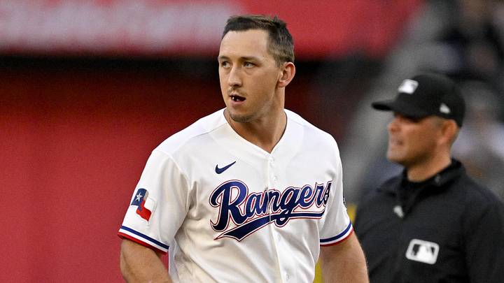 Apr 6, 2026; Arlington, Texas, USA; Texas Rangers left fielder Wyatt Langford (36) hits a double against the Seattle Mariners during the first inning at Globe Life Field. Mandatory Credit: Jerome Miron-Imagn Images