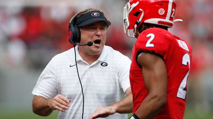 Georgia coach Kirby Smart celebrates with Georgia running back Kendall Milton (2) after he scored a touchdown during the first half of an NCAA college football game between Arkansas and Georgia in Athens, Ga., on Saturday, Oct. 2, 2021.

News Joshua L Jones