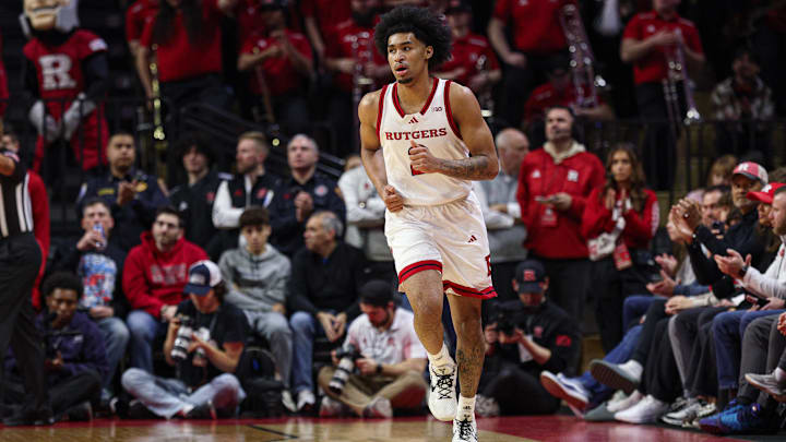 Mar 9, 2025; Piscataway, New Jersey, USA; Rutgers Scarlet Knights guard Dylan Harper (2) runs up court after a basket against the Minnesota Golden Gophers during the first half at Jersey Mike's Arena. Mandatory Credit: Vincent Carchietta-Imagn Images