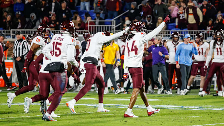 Nov 23, 2024; Durham, North Carolina, USA; Virginia Tech Hokies cornerback Dorian Strong (44) celebrates an interception with fans during the second half of the game against Duke Blue Devils at Wallace Wade Stadium. Mandatory Credit: Jaylynn Nash-Imagn Images