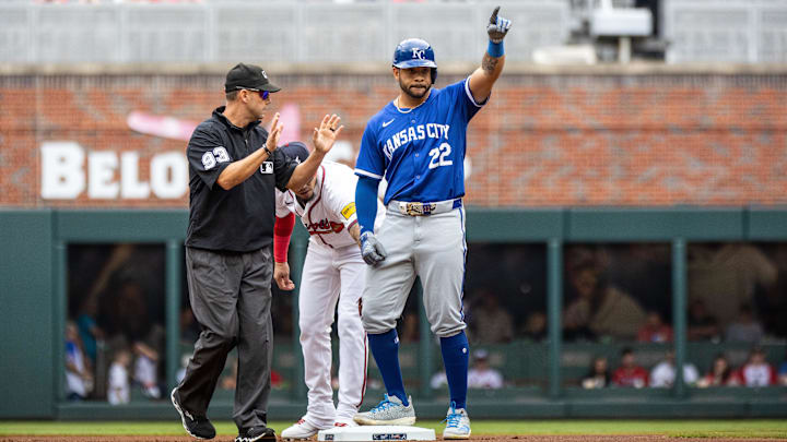 Kansas City Royals outfielder Tommy Pham (22) celebrates hitting a double against the Atlanta Braves during the first inning at Truist Park. 