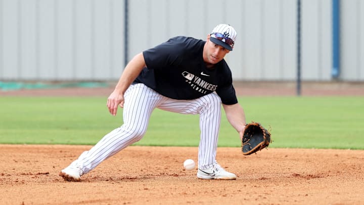 Feb 20, 2025; Tampa, FL, USA; New York Yankees first base Paul Goldschmidt (48) catches a ball during work outs at George M. Steinbrenner Field. Feb 20, 2025; Tampa, FL, USA; New York Yankees first base Paul Goldschmidt (48) catches a ball during work outs at George M. Steinbrenner Field.