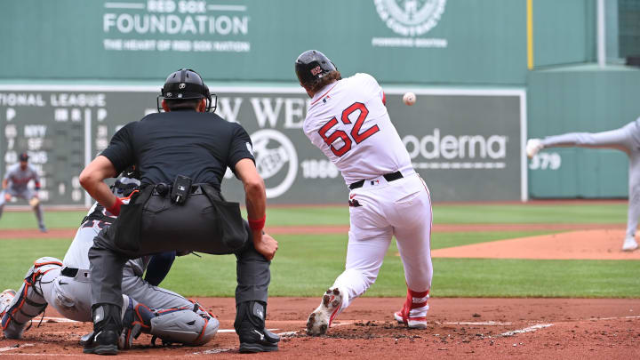 Jun 2, 2024; Boston, Massachusetts, USA;  Boston Red Sox right fielder Wilyer Abreu (52) hits a double against the Detroit Tigers during the first inning at Fenway Park.