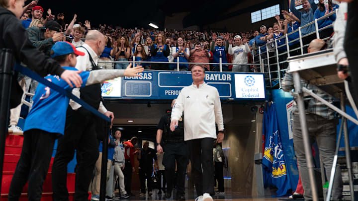 Kansas coach Bill Self walks on to the court at Allen Fieldhouse before taking on Baylor